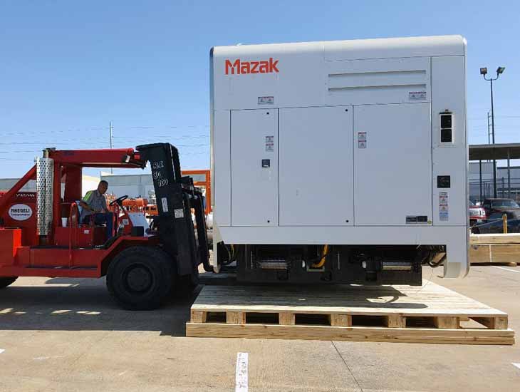 Equipment on skid on forklift