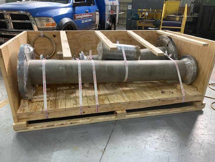 Large pipes in crate