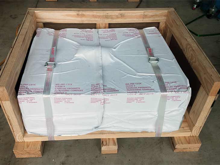 Vacumm wrapped equipment in crate