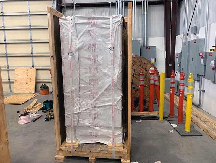 Vacumm wrapped equipment in crate